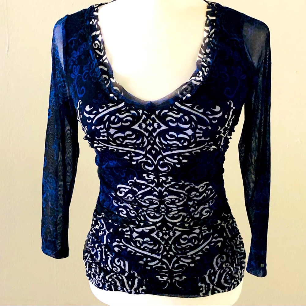 INC stretchy, top w sheer long sleeves, design